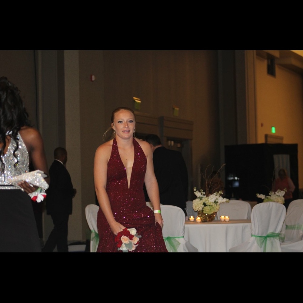 Red formal dress, spandex material but not cheap.